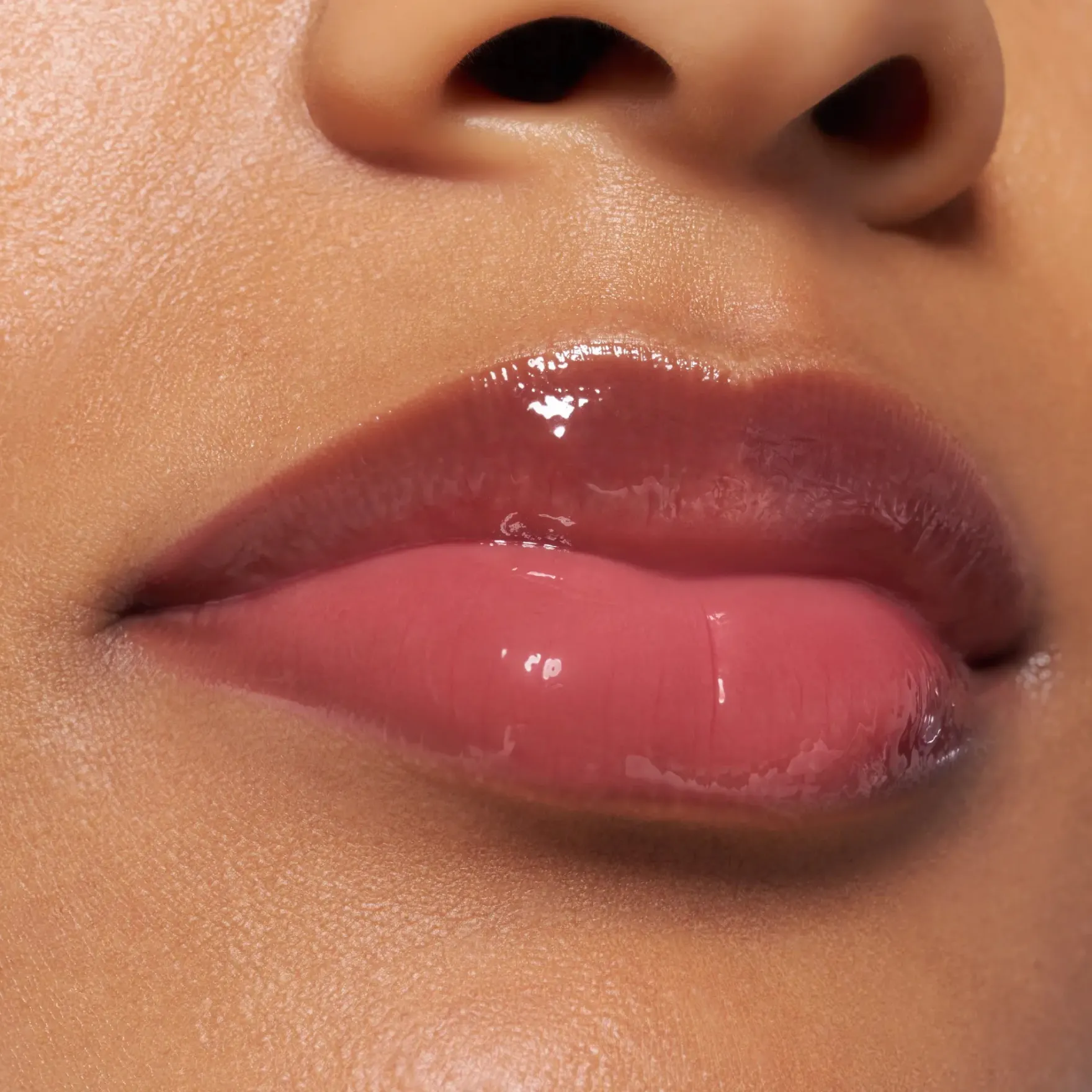 The Super Peptide Glossy Lip Treatment 06 Plumfection!
